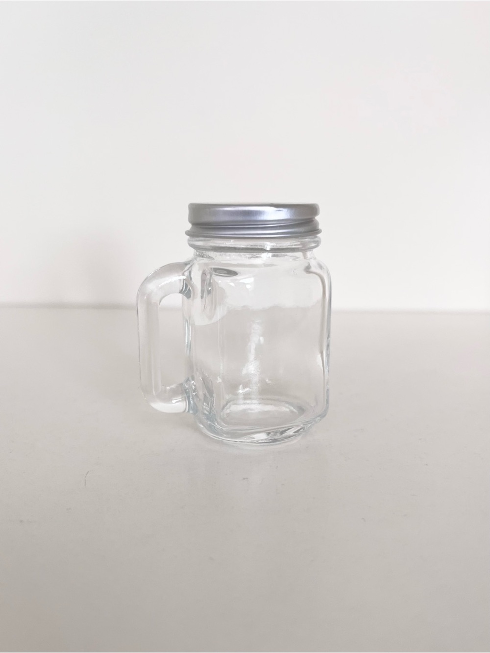 Mini glass mason jar with handle and lid